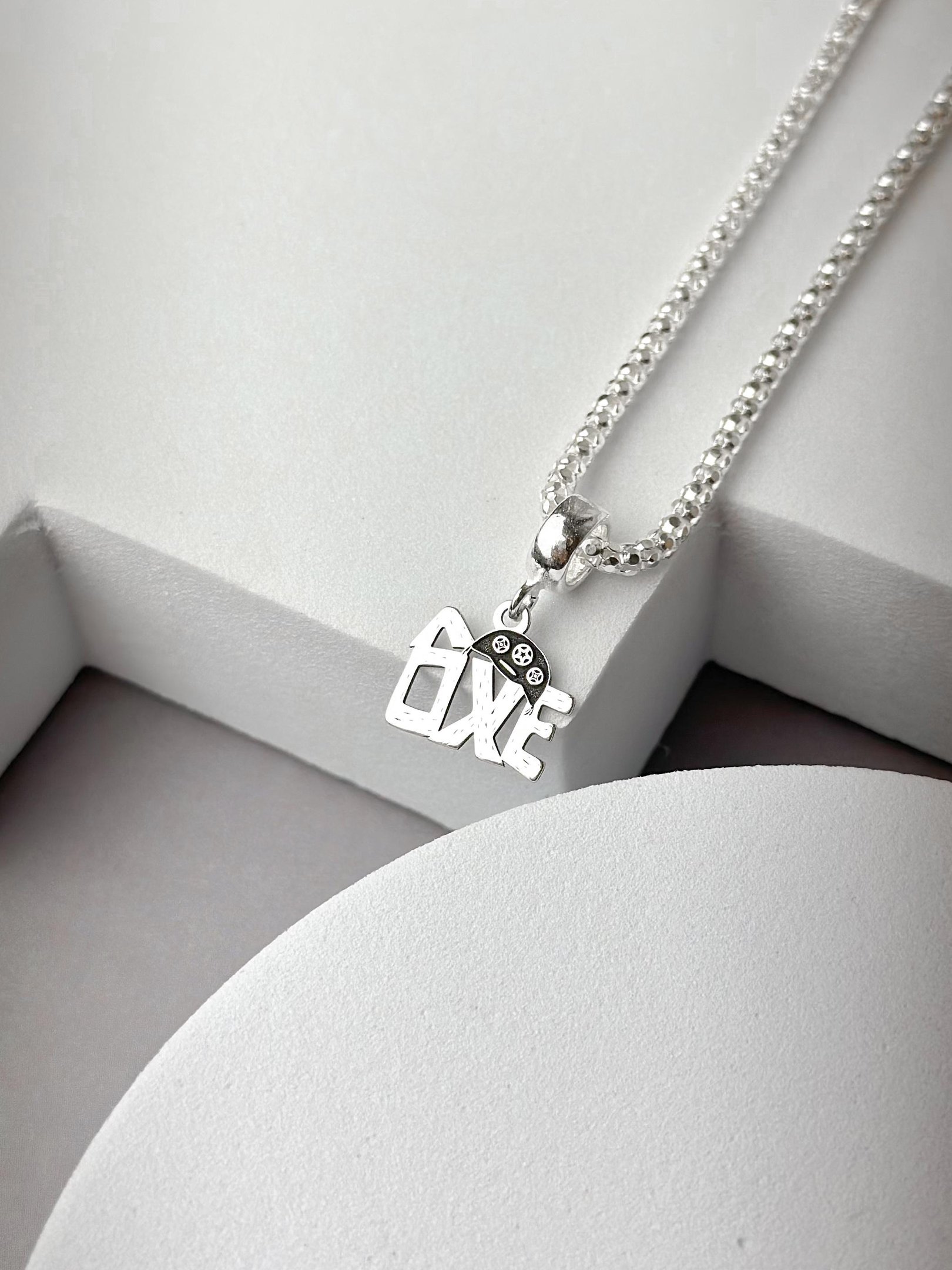 Berloque de Prata Manuscrito Oxe