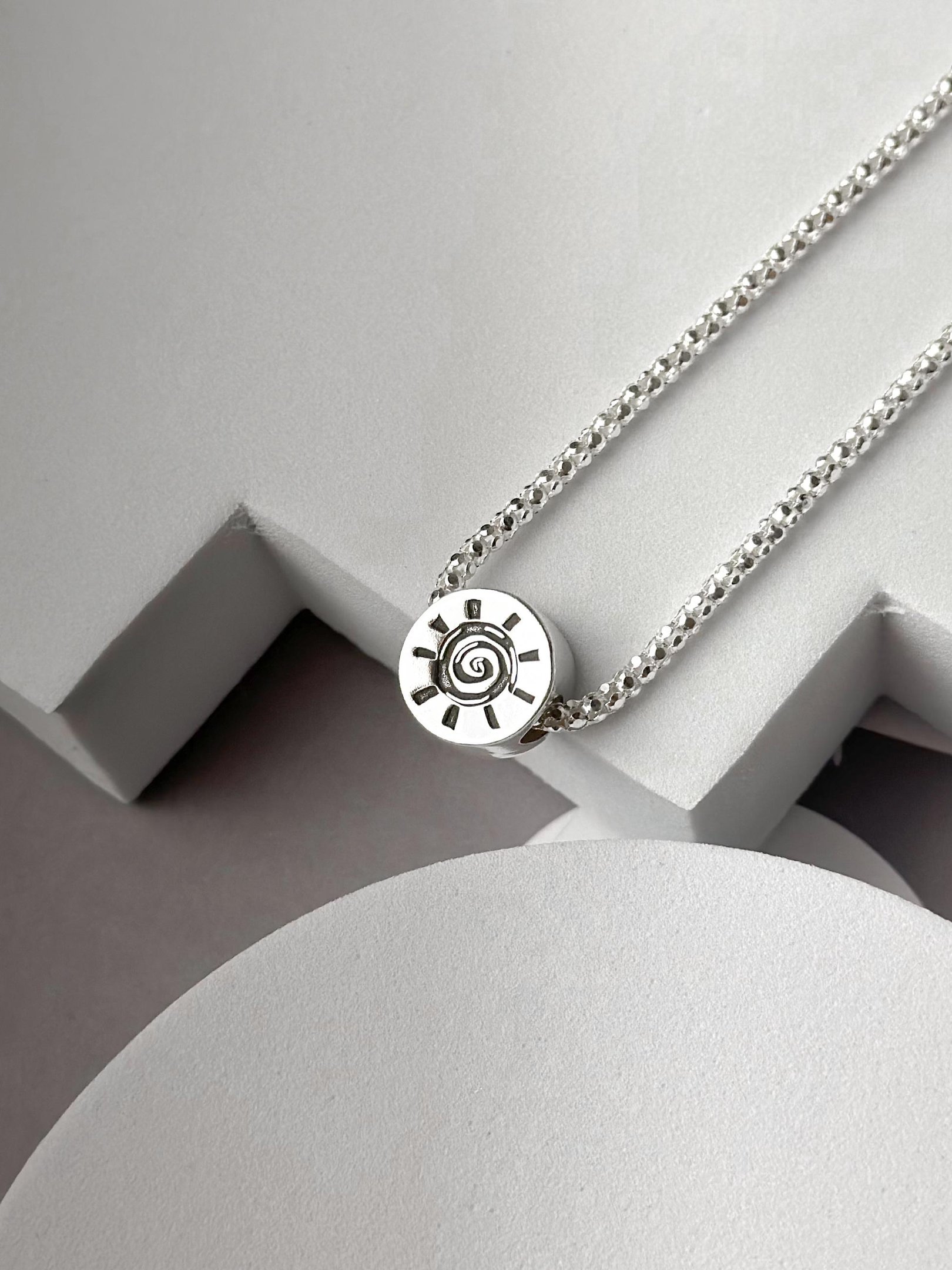 Berloque de Prata Separador Sol e Lua Nordestina